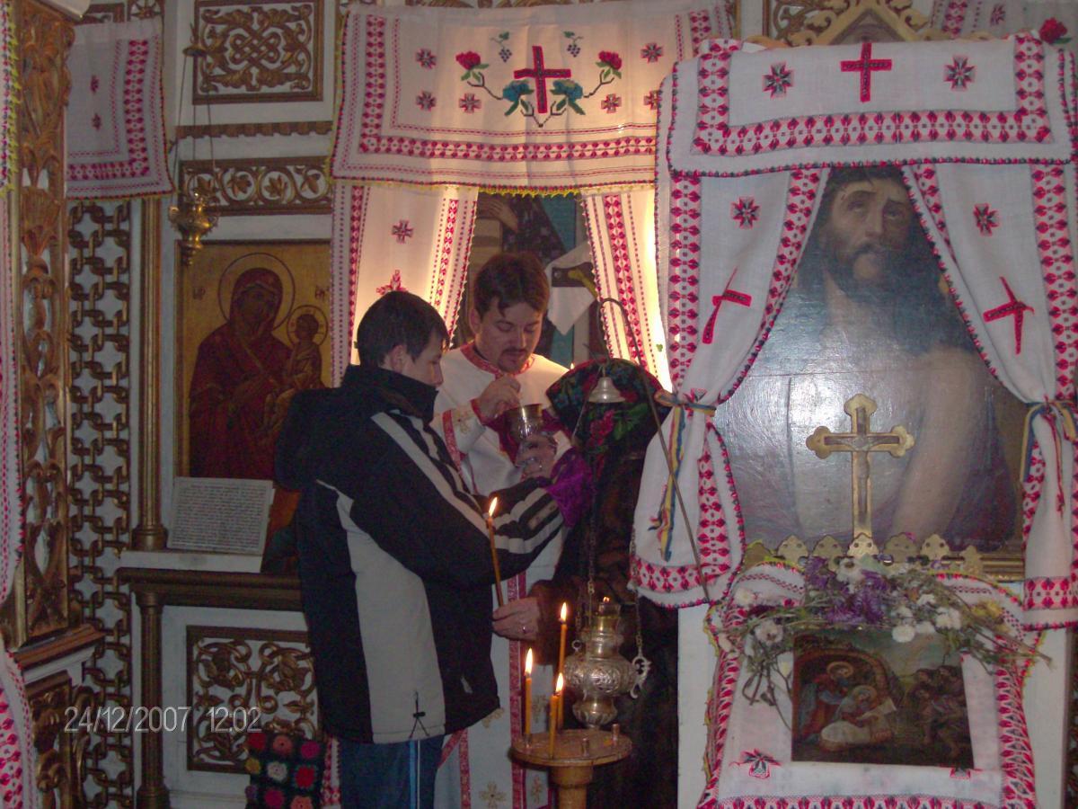 Împărtăşirea enoriaşilor